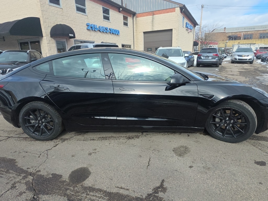 used 2022 Tesla Model 3 car, priced at $23,895