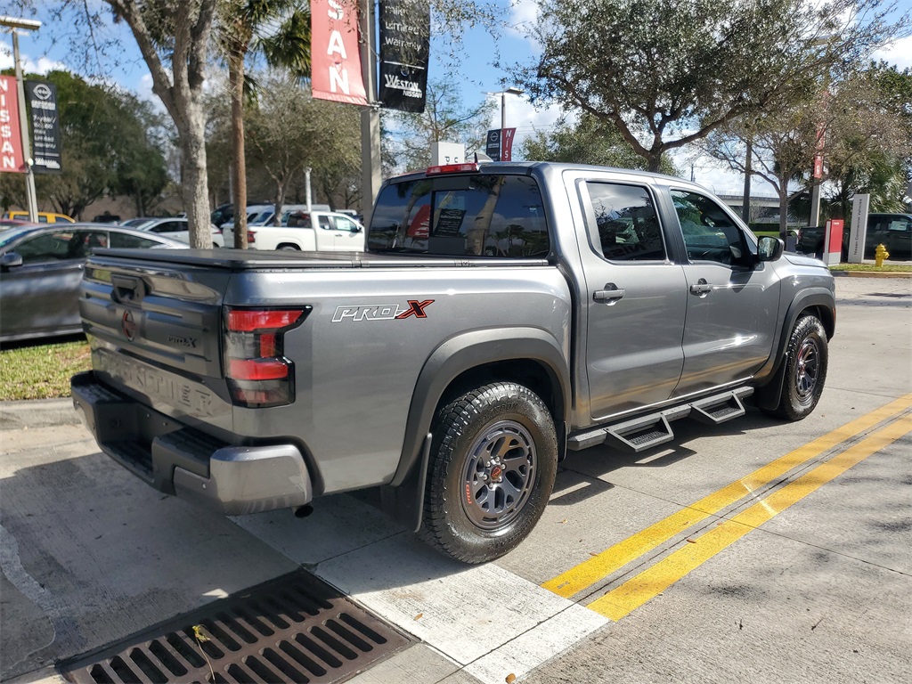 used 2025 Nissan Frontier car, priced at $32,895
