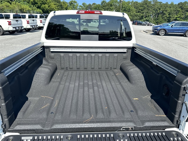 2025 Glacier White Nissan Frontier SV 4X4 Truck
