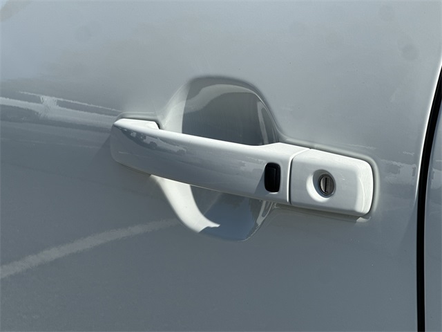 2025 Glacier White Nissan Frontier SV 4X4 Truck