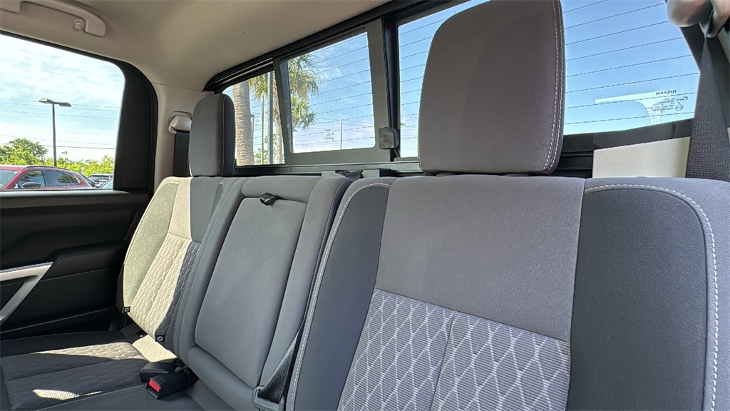 2024 Deep Blue Pearl Nissan Titan SV 4X4 Truck