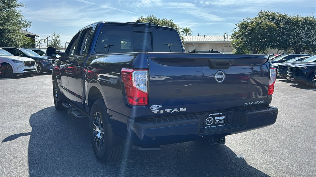 2024 Deep Blue Pearl Nissan Titan SV 4X4 Truck