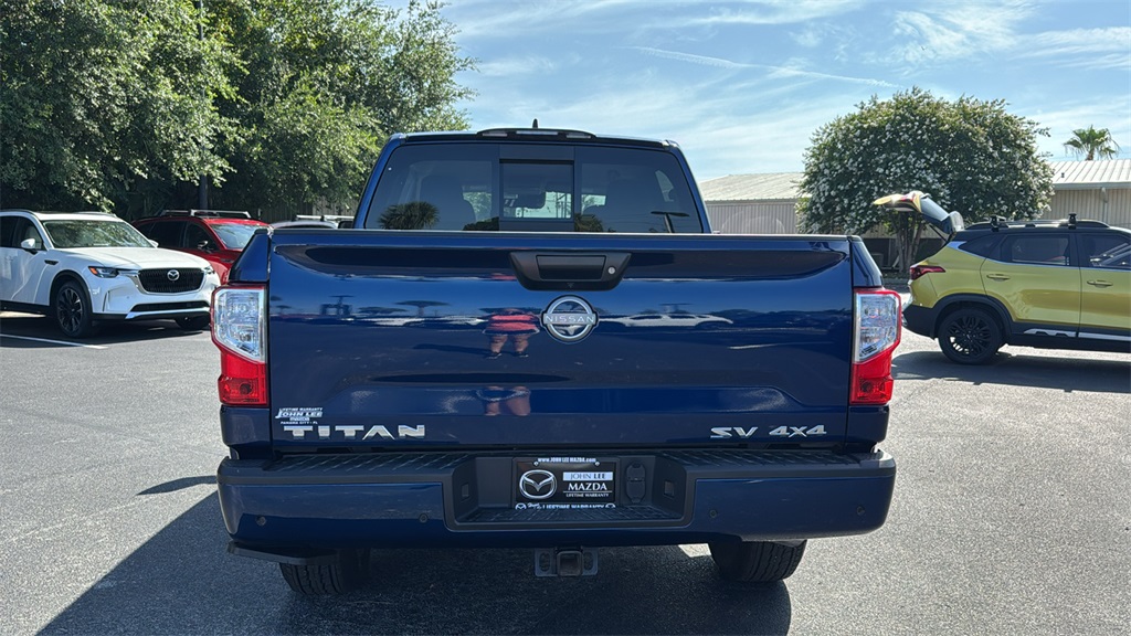 2024 Deep Blue Pearl Nissan Titan SV 4X4 Truck
