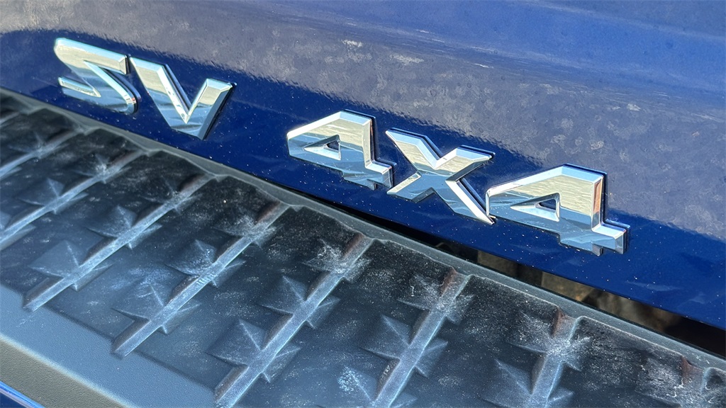 2024 Deep Blue Pearl Nissan Titan SV 4X4 Truck