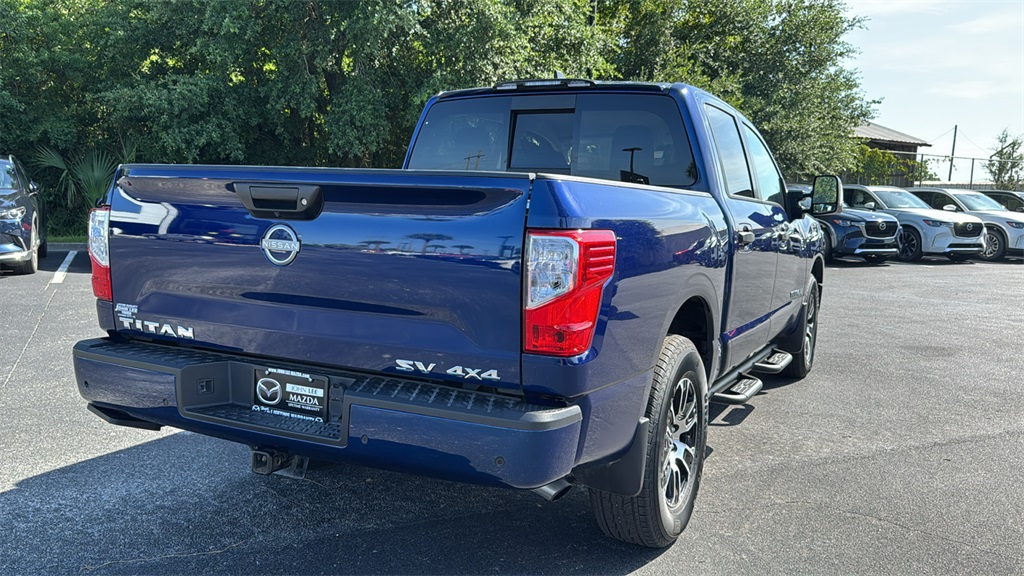 2024 Deep Blue Pearl Nissan Titan SV 4X4 Truck