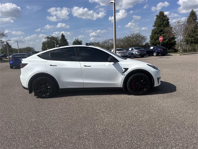 Used 2024 Tesla Model Y Long Range with VIN 7SAYGDED5RF098039 for sale in Haines City, FL