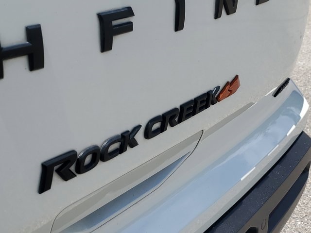 2023 Pearl White Tricoat/Super Black Nissan Pathfinder Rock Creek 4X4 SUV