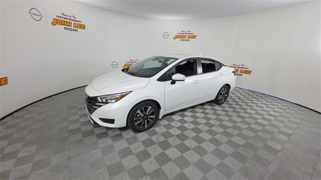 2025 Aspen White Tricoat Nissan Versa 1.6 SV Sedan