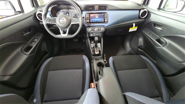 2025 Aspen White Tricoat Nissan Versa 1.6 SV FWD Sedan