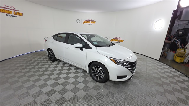 2025 Aspen White Tricoat Nissan Versa 1.6 SV FWD Sedan