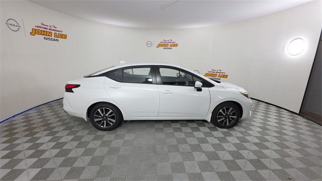 2025 Aspen White Tricoat Nissan Versa 1.6 SV FWD Sedan
