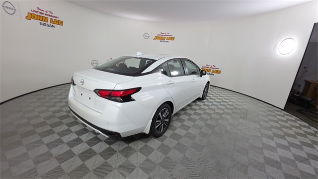 2025 Aspen White Tricoat Nissan Versa 1.6 SV FWD Sedan