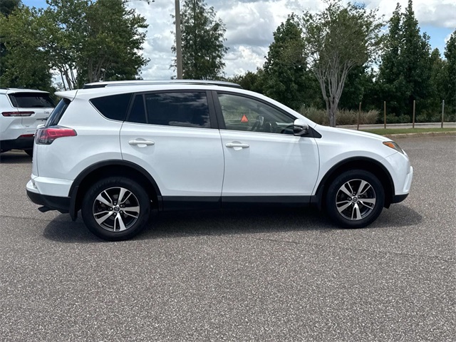 Used 2017 Toyota RAV4 XLE with VIN JTMRFREV7HD199311 for sale in Haines City, FL