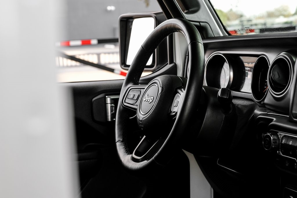 used 2021 Jeep Wrangler car, priced at $27,643