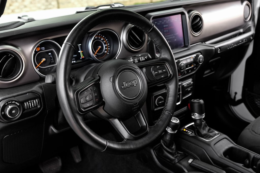 used 2021 Jeep Wrangler car, priced at $27,643