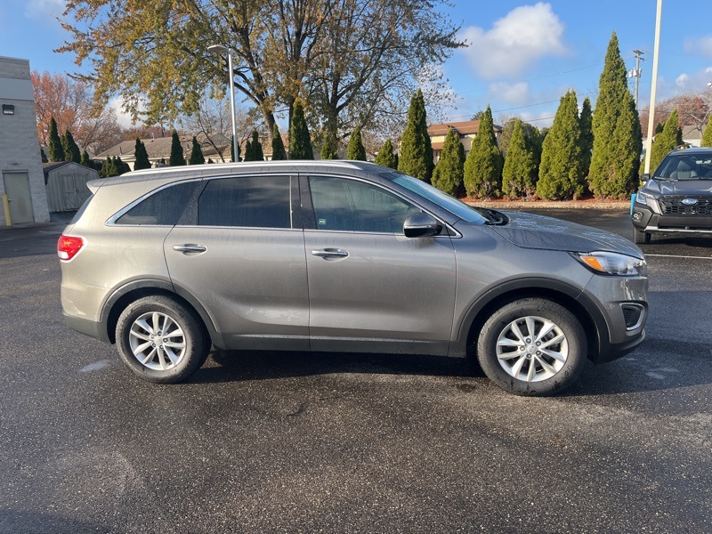 Used 2016 Kia Sorento LX with VIN 5XYPG4A39GG053861 for sale in Massillon, OH