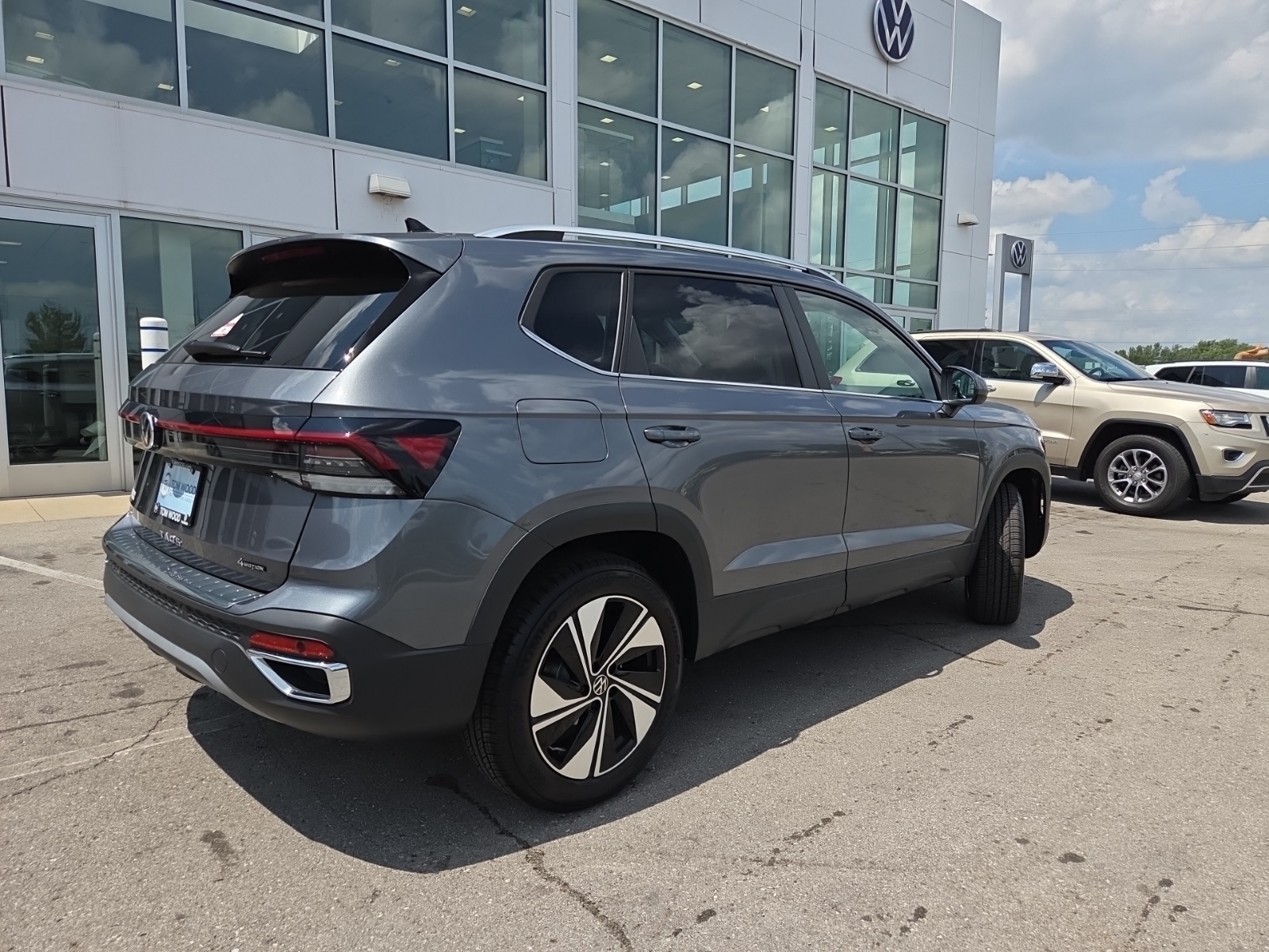 new 2025 Volkswagen Taos car, priced at $27,000
