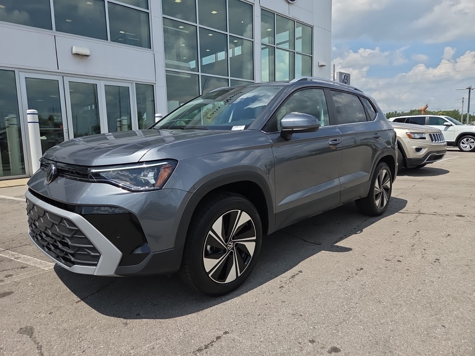 new 2025 Volkswagen Taos car, priced at $27,000