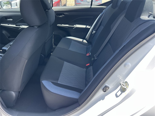 2025 Aspen White Tricoat Nissan Versa 1.6 SV FWD Sedan