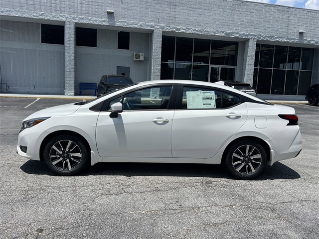 2025 Aspen White Tricoat Nissan Versa 1.6 SV FWD Sedan