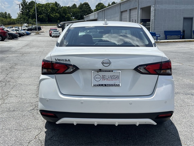 2025 Aspen White Tricoat Nissan Versa 1.6 SV FWD Sedan