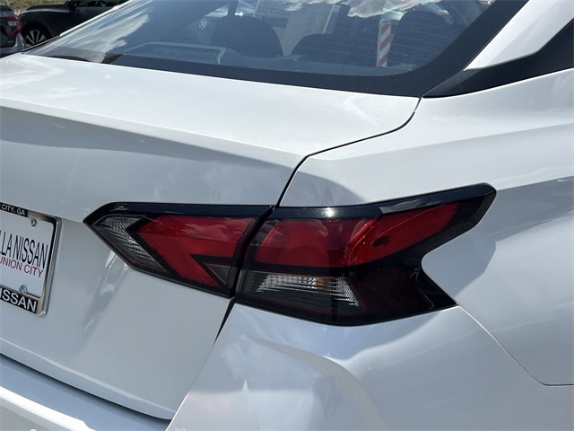 2025 Aspen White Tricoat Nissan Versa 1.6 SV FWD Sedan