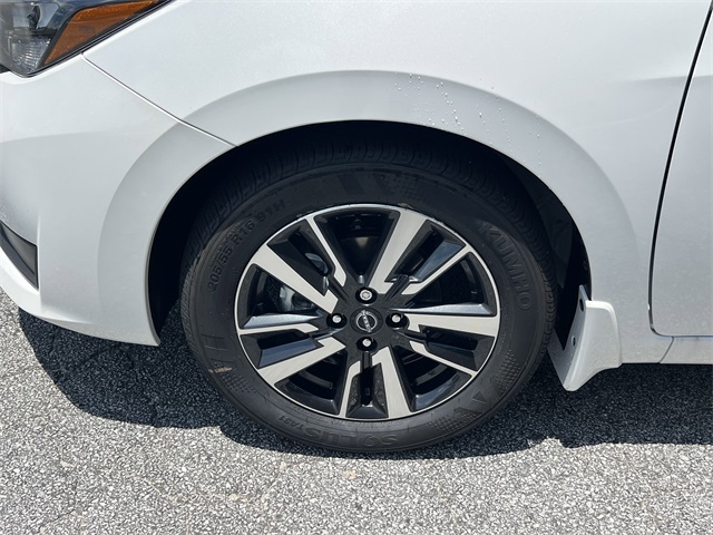 2025 Aspen White Tricoat Nissan Versa 1.6 SV FWD Sedan