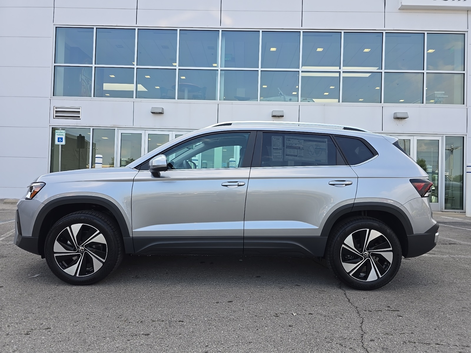 new 2025 Volkswagen Taos car, priced at $27,053