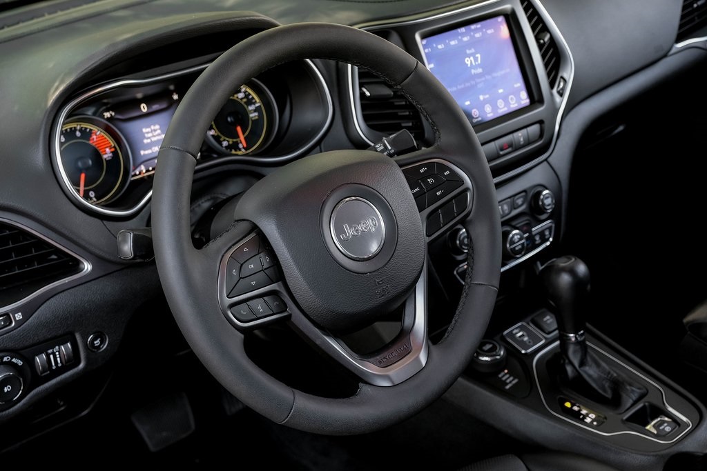 used 2022 Jeep Cherokee car, priced at $25,013