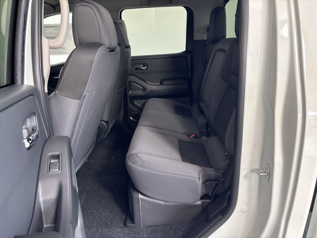 2025 Glacier White Nissan Frontier SV 4X4 Truck