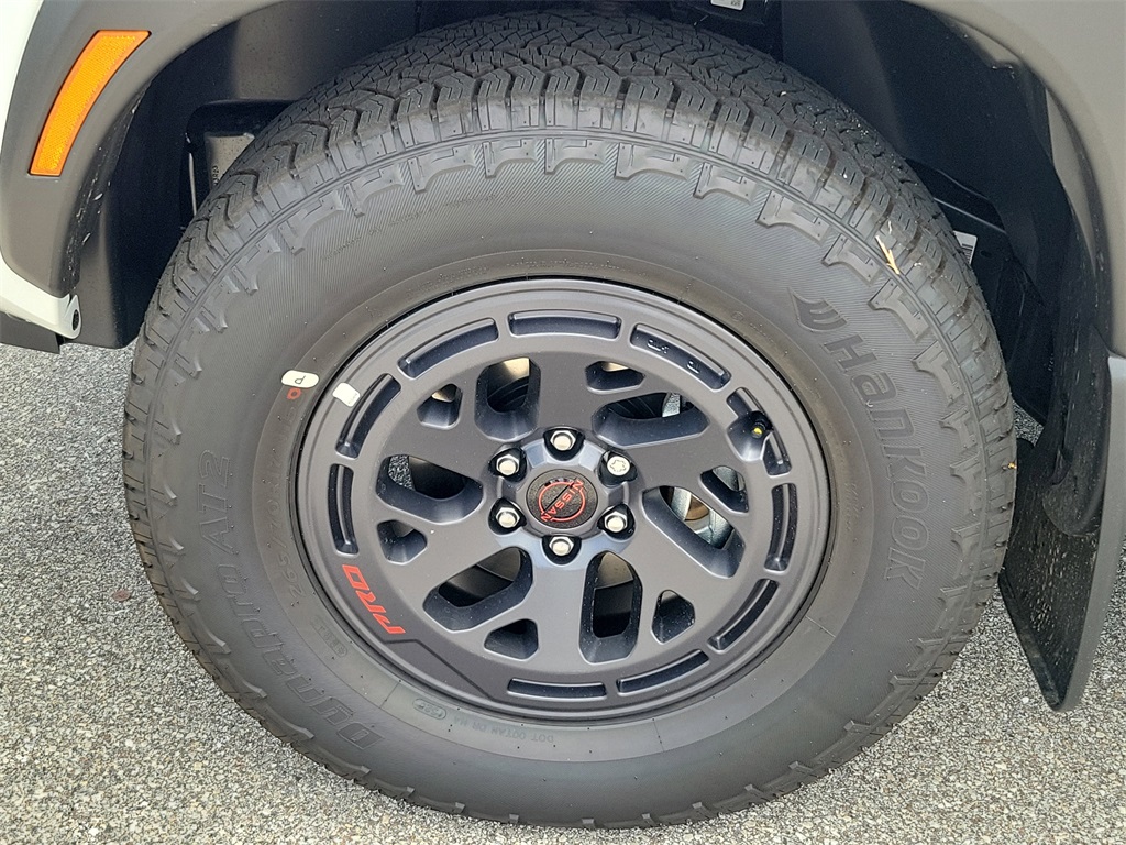 2025 Glacier White Nissan Frontier PRO-4X 4X4 Truck