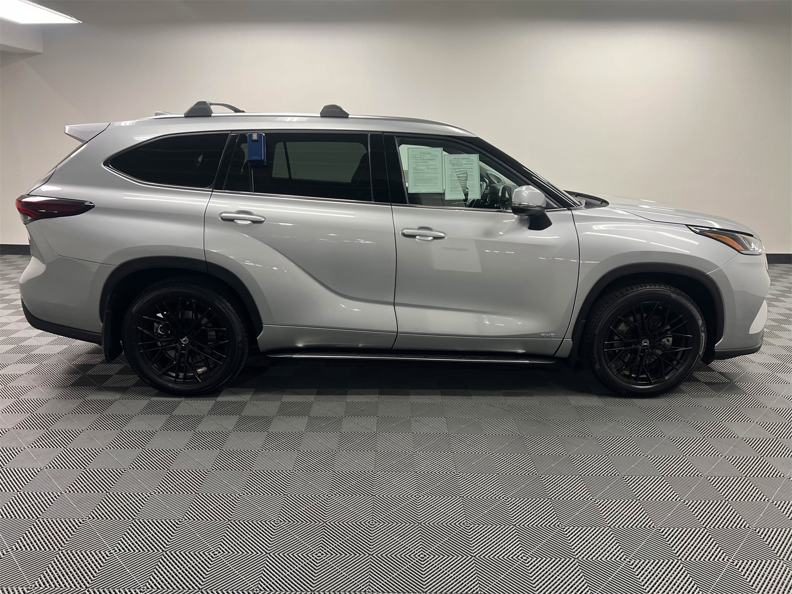 used 2024 Toyota Highlander Hybrid car, priced at $48,788