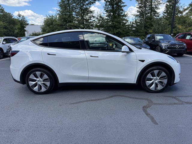 Used 2023 Tesla Model Y Long Range with VIN 7SAYGDEE4PA115884 for sale in Kansas City