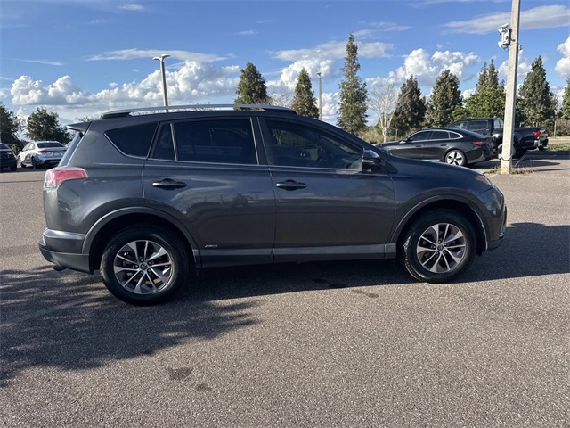 Used 2018 Toyota RAV4 LE with VIN JTMRJREV1JD171198 for sale in Haines City, FL