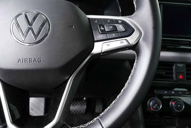 used 2024 Volkswagen Taos car, priced at $19,400