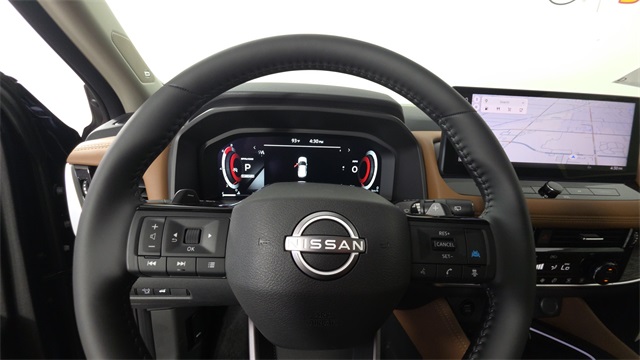 2025 Deep Ocean Blue Pearl/Super Black Nissan Rogue Platinum FWD SUV
