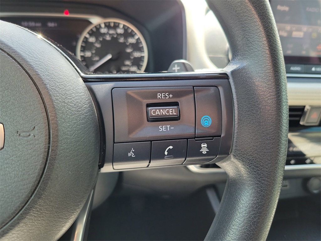 2021 Scarlet Ember Tintcoat Nissan Rogue SV FWD SUV