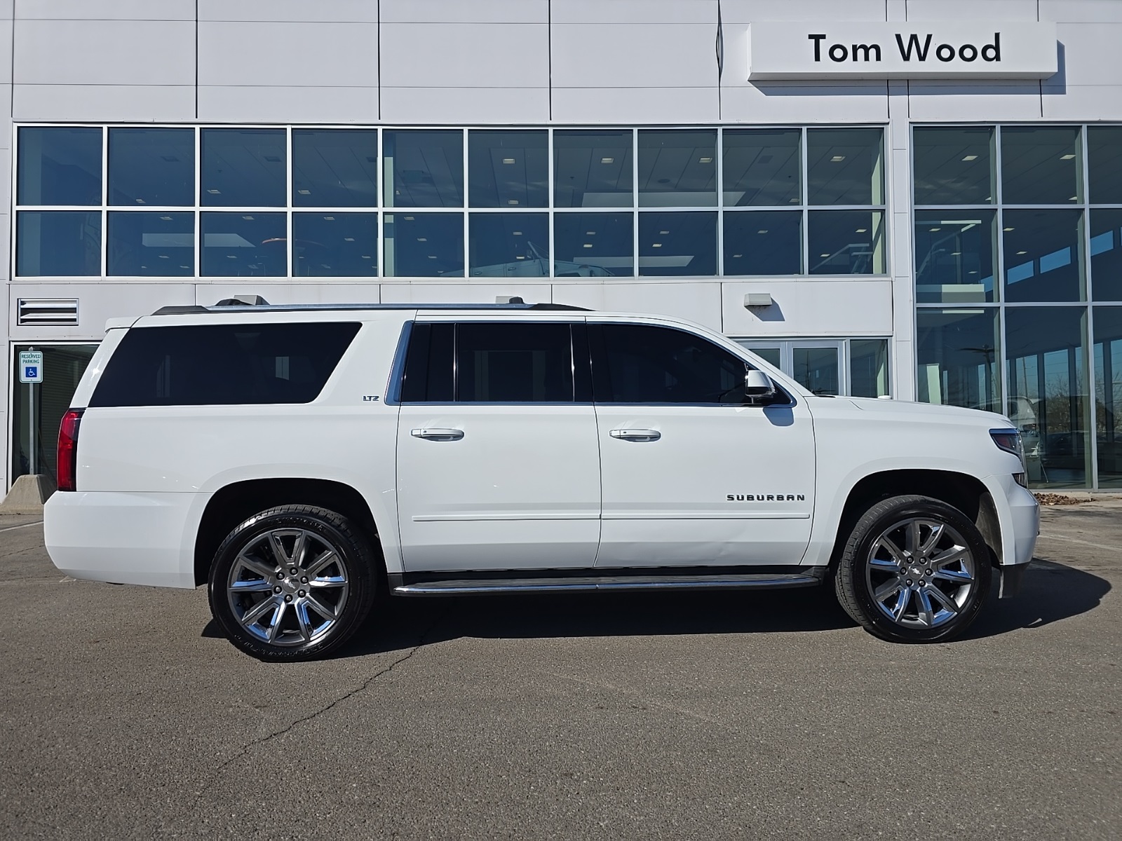 used 2015 Chevrolet Suburban car, priced at $15,000