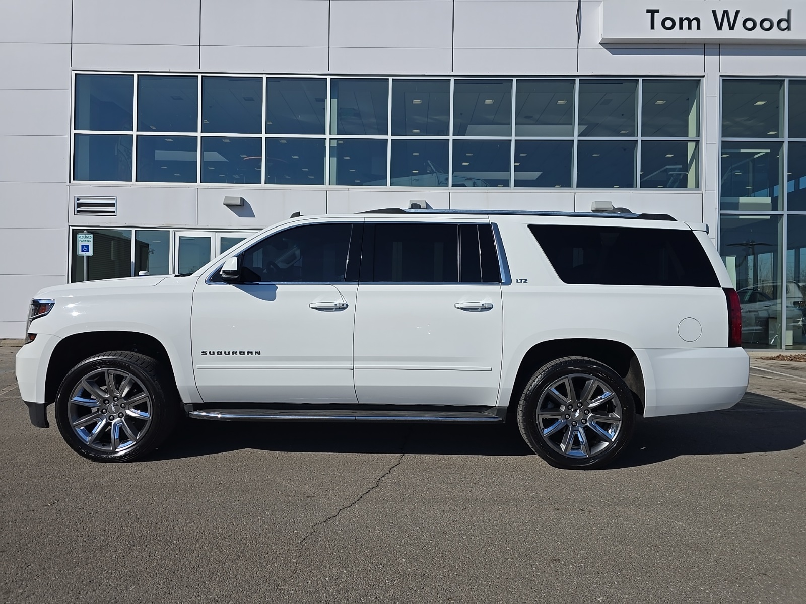 used 2015 Chevrolet Suburban car, priced at $15,000