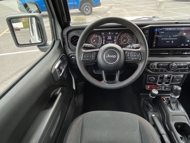 used 2024 Jeep Wrangler car, priced at $36,856