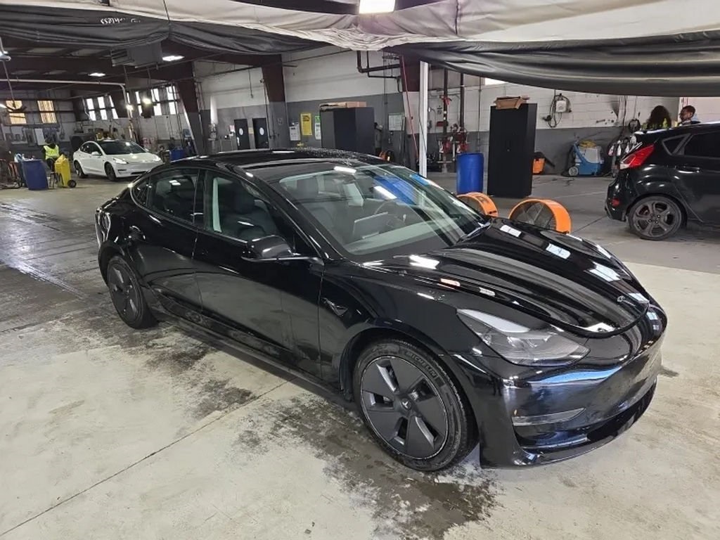 Used 2022 Tesla Model 3 Base with VIN 5YJ3E1EAXNF353988 for sale in Cleveland, OH