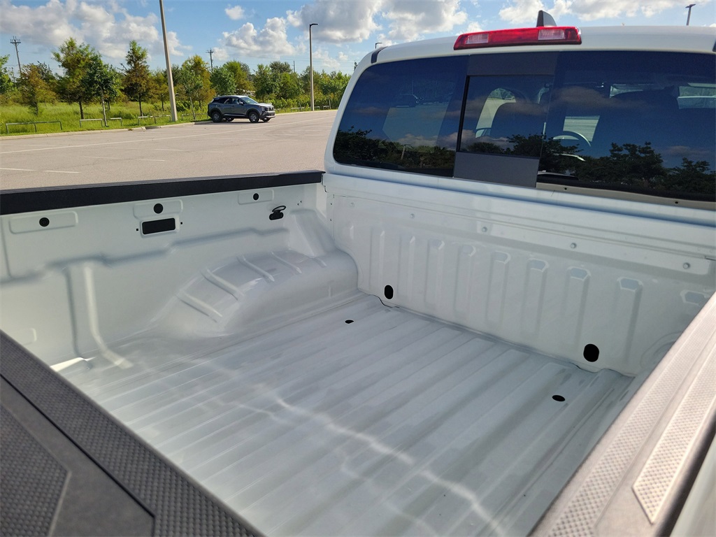 2025 Glacier White Nissan Frontier SV RWD Truck