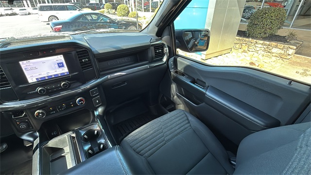 used 2023 Ford F-150 car, priced at $32,142