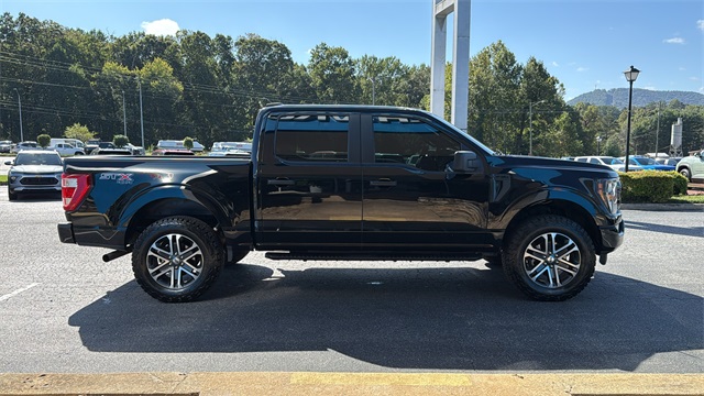 used 2023 Ford F-150 car, priced at $32,142