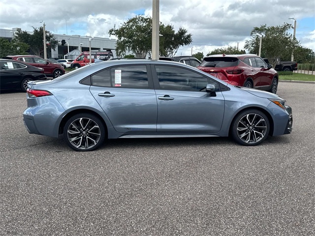 Used 2022 Toyota Corolla XSE with VIN 5YFT4MCE1NP100055 for sale in Haines City, FL