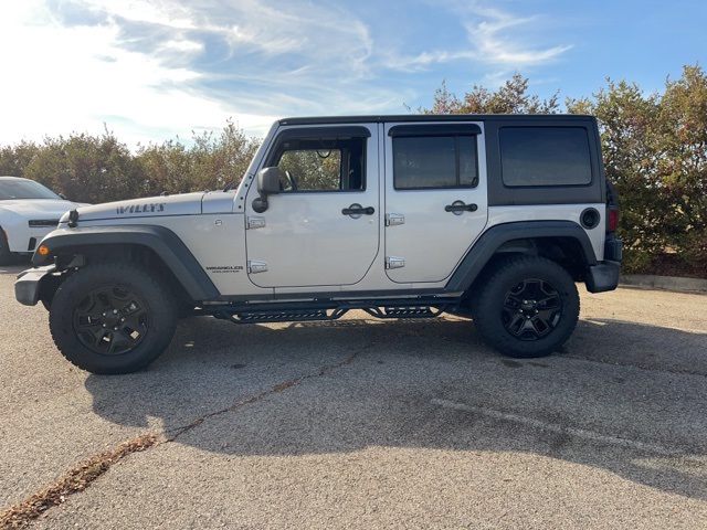 Used 2016 Jeep Wrangler Unlimited Willys Wheeler with VIN 1C4BJWDG7GL201872 for sale in Beech Island, SC