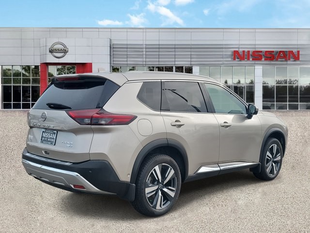 2023 Champagne Silver Metallic Nissan Rogue Platinum AWD SUV