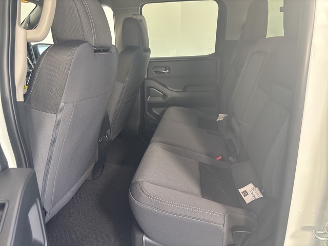 2025 Glacier White Nissan Frontier SV 4X4 Truck