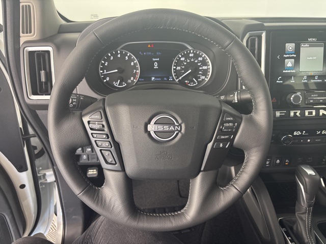 2025 Glacier White Nissan Frontier SV 4X4 Truck