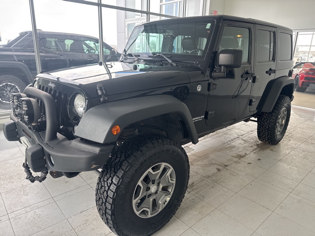 Used 2014 Jeep Wrangler Unlimited Rubicon with VIN 1C4BJWFG4EL115347 for sale in Rochester, Minnesota